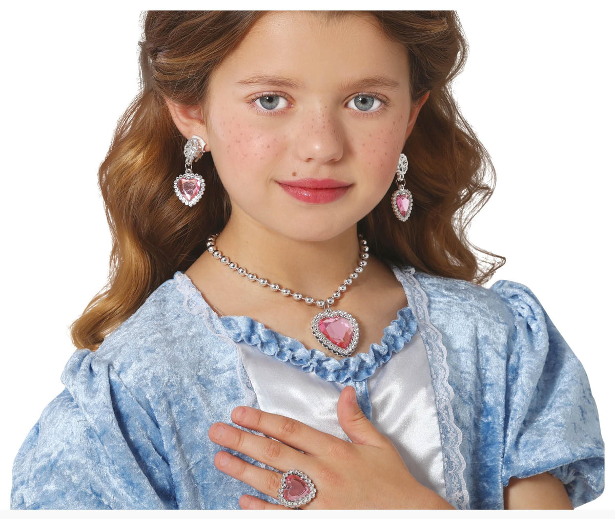 Young girl wearing a heart-shaped jewelry set with a white background