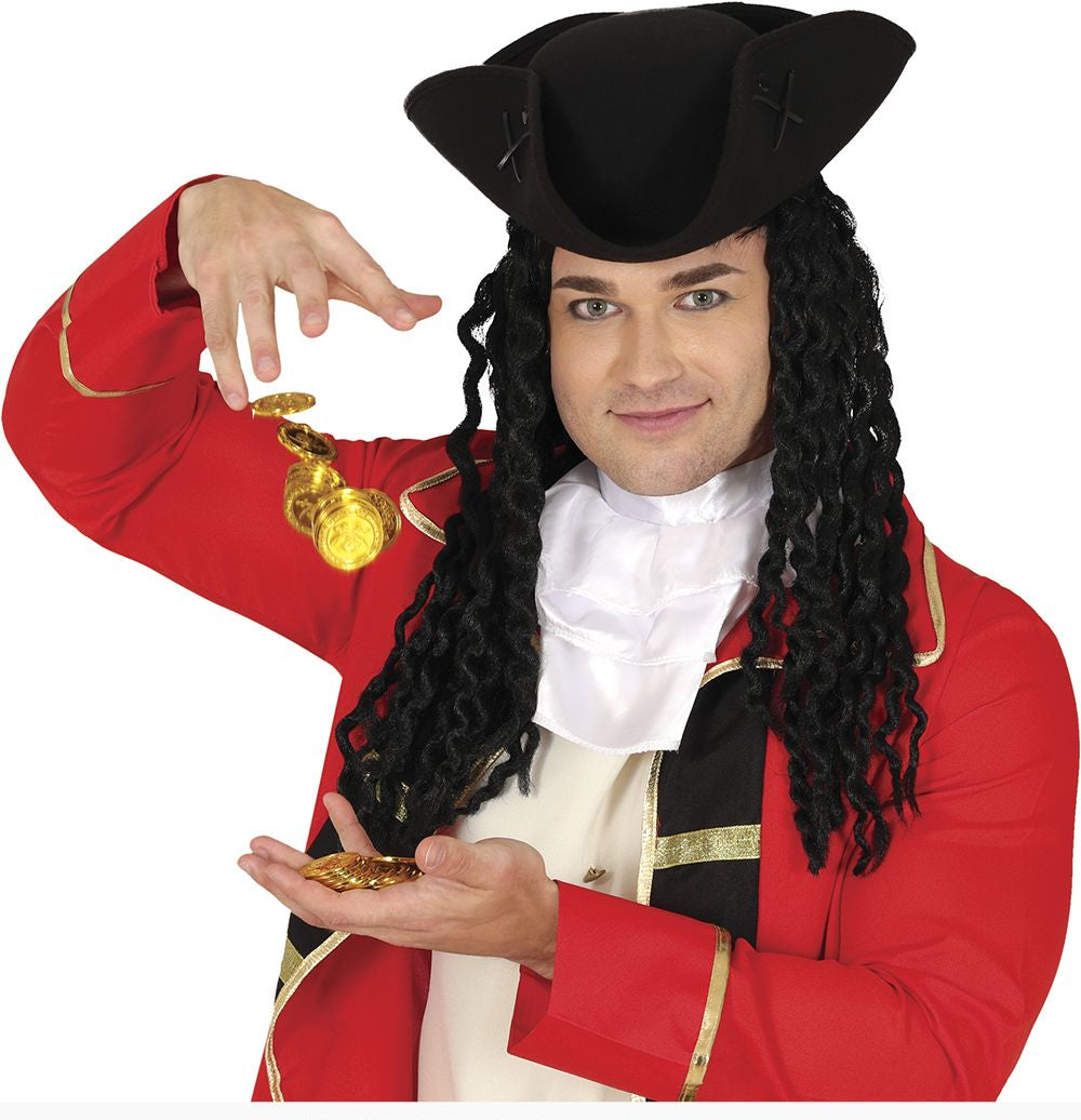 A man modeling a pirate costume consisting of a red coat with gold trim, a white cravat, a black tricorn hat, and a long black curly wig, while holding gold coins against a white background.