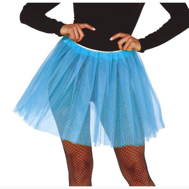 Person wearing a blue tutu skirt with black top and fishnet stockings on a white background.