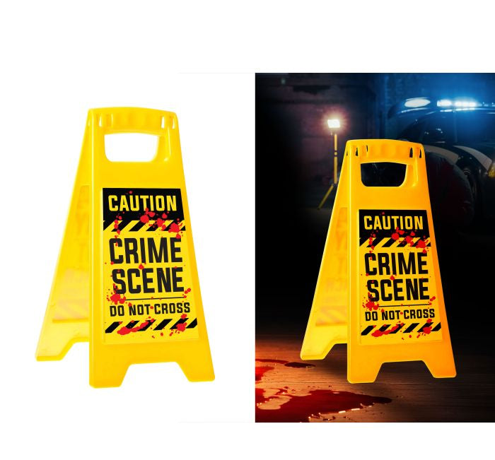 Yellow A-frame sidewalk warning sign with 'CAUTION CRIME SCENE DO NOT CROSS' text, shown on a white background and also pictured in a dark outdoor scene with red blood-like splatter.