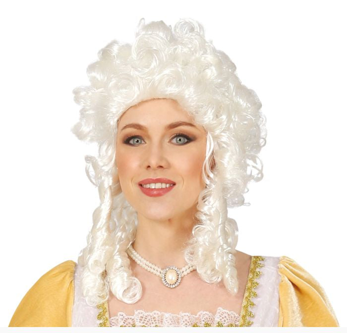 A woman wearing a white 18th-century style powdered wig with long curls, a pearl necklace, and a yellow and white costume top, shown against a plain white background.
