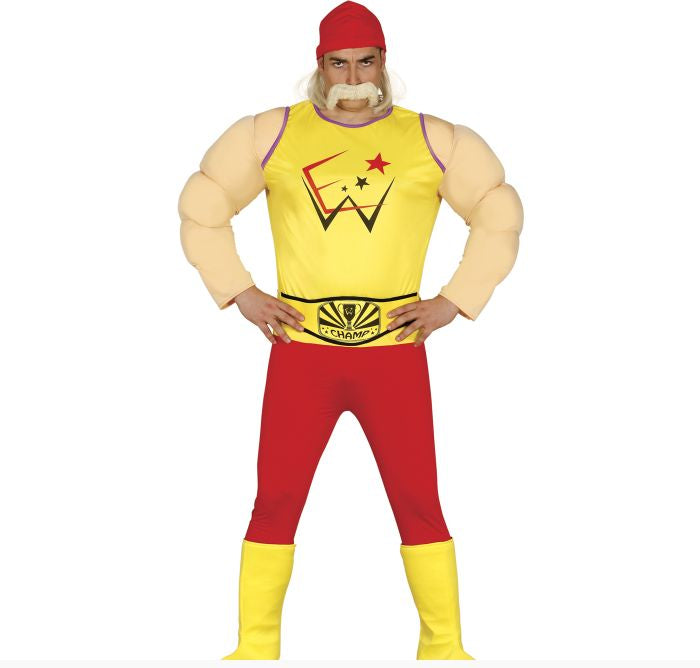 A man modeling a Hulk-style costume consisting of a yellow tank top with a red and black graphic, red pants, yellow leg warmers, a red hat, and a fake white mustache, against a plain white background.