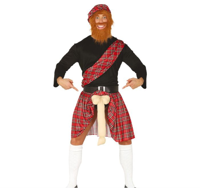 Person wearing a Scottish costume with a kilt, tartan sash, and wig on a white background.