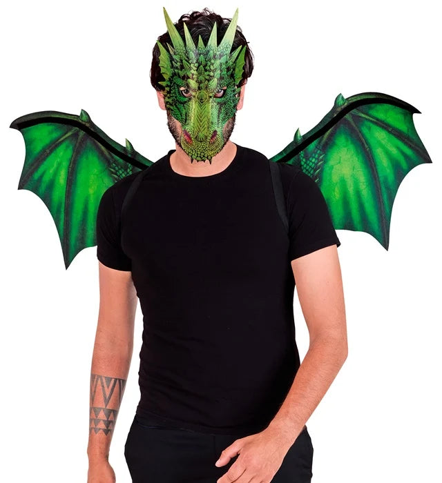 Person wearing a green dragon mask and wings on a white background