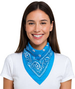 Woman wearing a blue bandana with white patterns on a white shirt