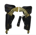 Pair of gold and black cowboy revolvers with holsters on a white background