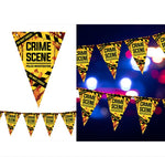 Crime scene themed party bunting banner flags with yellow and black caution tape design, featuring 'CRIME SCENE' and 'POLICE INVESTIGATION' text, shown both as individual pennants and hanging in a string against a dark background with colorful bokeh lights.