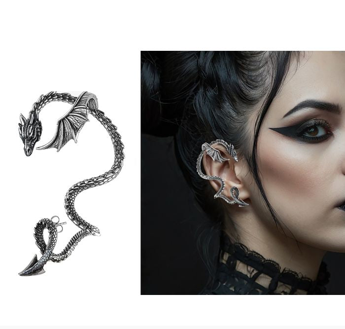 A gothic dragon ear cuff in silver-tone metal, shown both as a standalone product on the left and worn on a model's ear on the right. The model has dark hair, black eye makeup, and a black lace collar.