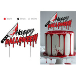 Halloween cake topper featuring a knife with red glittery blood splatter and the words 'Happy Halloween' in black and red dripping lettering. Shown both as a standalone product on a white background with color legend, and displayed on a white frosted cake with red dripping icing.