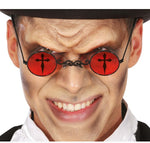 Person wearing red sunglasses with black cross designs and a black hat.
