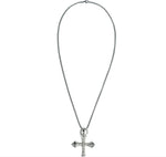 A silver-toned cross pendant necklace with a textured, diamond-like pattern, suspended on a fine silver chain against a white background.