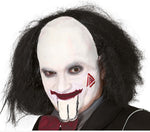 Person wearing a white makeup costume with black hair and red bow tie on a white background