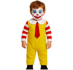 A child wearing a Ronald McDonald-style clown costume against a plain white background. The costume includes a white face mask with red and blue makeup, a red-and-white striped long-sleeve top, a red tie, and yellow pants.