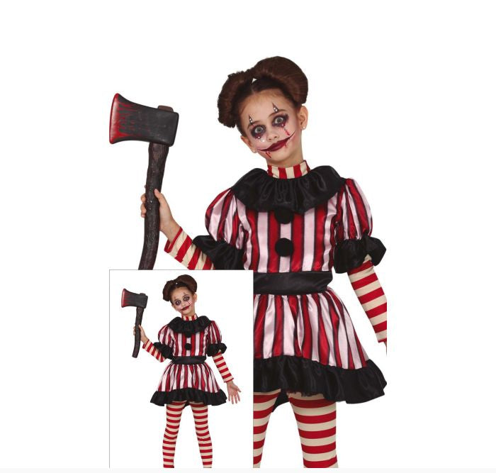 A child model wearing a creepy clown costume with red and white vertical stripes, black ruffled collar and hem, striped tights, and holding a toy axe.