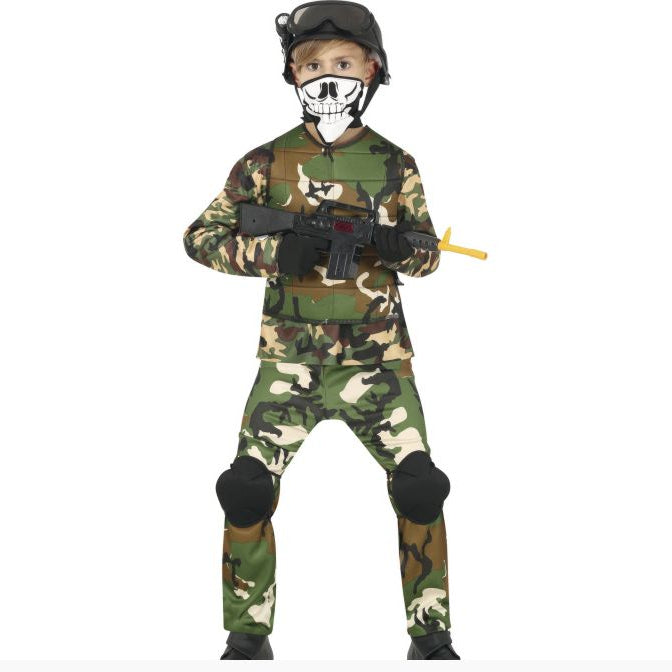 A child modeling a military camouflage costume set, including a long-sleeve shirt, pants, knee pads, and a black helmet with a skull-print face mask, holding a toy rifle against a white background.