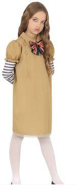 Child wearing a beige dress with a Union Jack bow tie on a white background