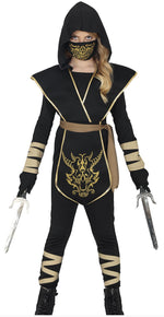 A woman modeling a black ninja costume with gold trim, a gold face mask, and two silver practice swords against a plain white background.