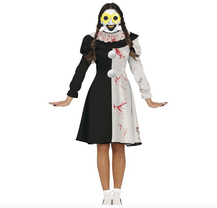 A model wearing a creepy doll costume featuring a black and white dress with red blood splatters, a white ruffled collar, and a yellow and black skull mask, shown against a plain white background.