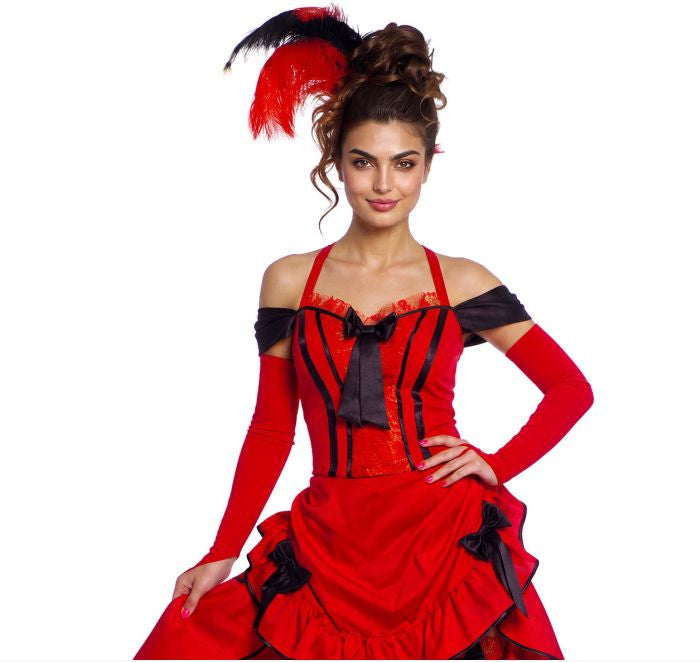A woman modeling a red and black Spanish-style costume dress with long red sleeves, black trim, and a matching red feathered headpiece against a white background.