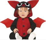 Child wearing a red and black bat costume with large ears and wings on a white background.