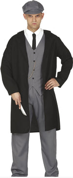 A man modeling a vintage-style costume consisting of a black long coat, gray vest and trousers, a white shirt, black tie, and a gray flat cap, holding a knife prop against a white background.