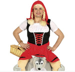 A man wearing a Red Riding Hood costume, sitting on a gray plush wolf toy and holding a wicker basket, against a white background.