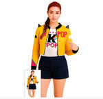Woman wearing a yellow jacket with cat ears, white t-shirt with 'K POP' text, and black shorts on a white background.