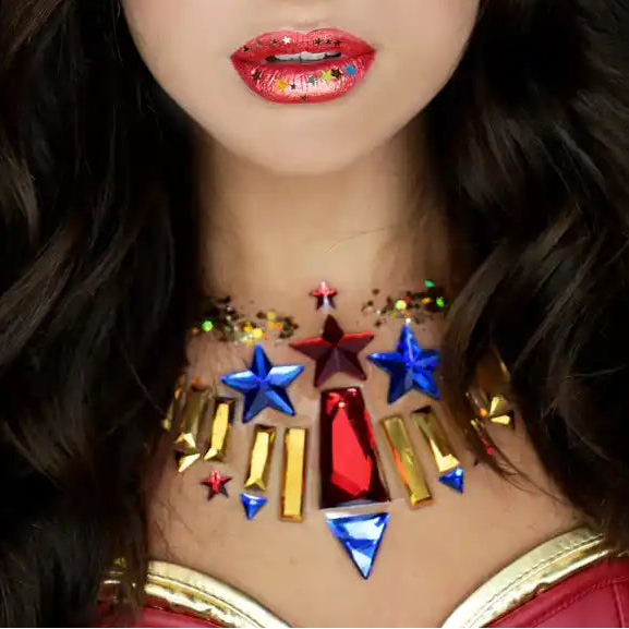 Woman with colorful face and body makeup resembling a superhero costume.